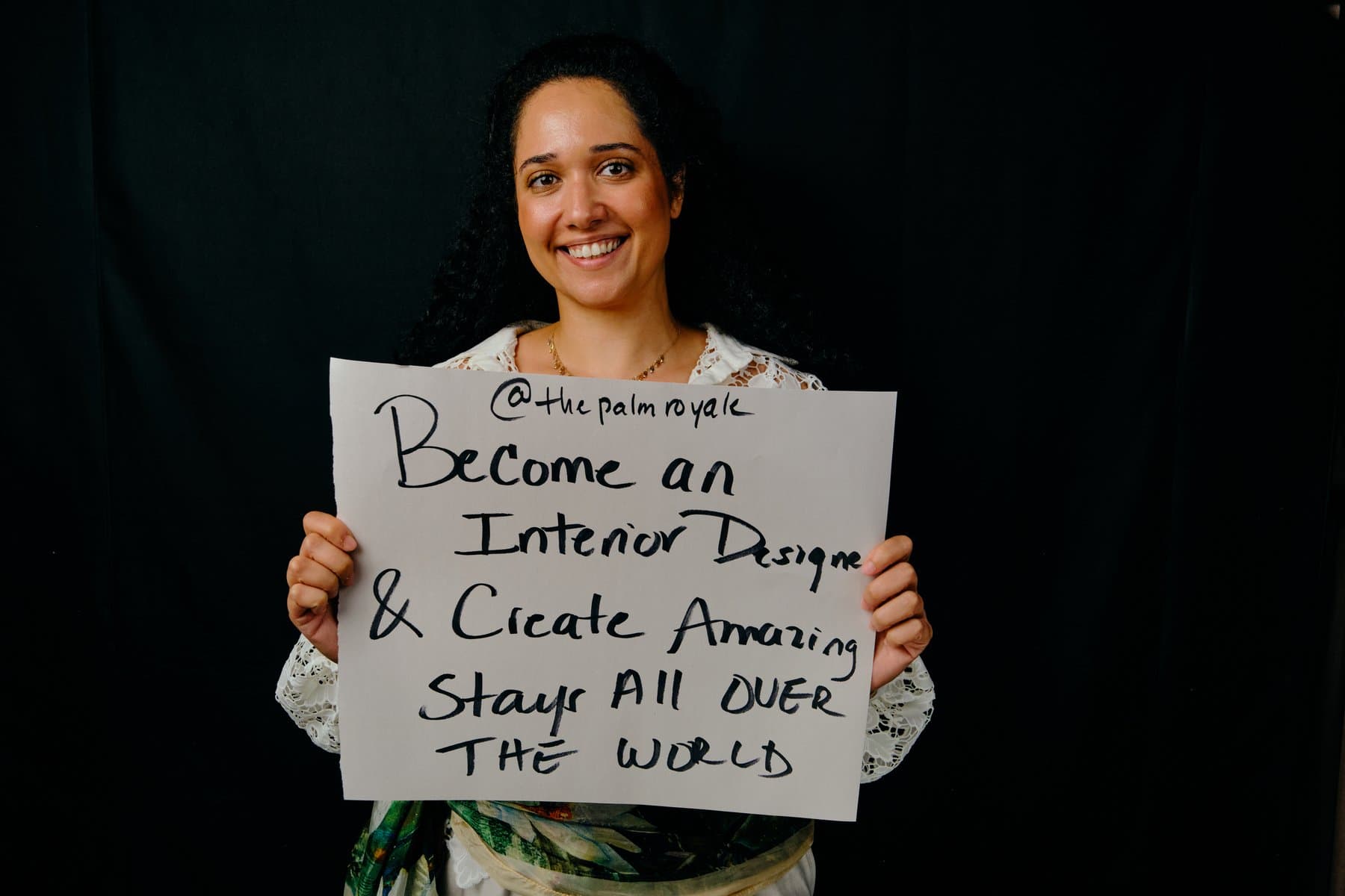 Dreams & Obstacles, August 10 — a dreamer holding their sign