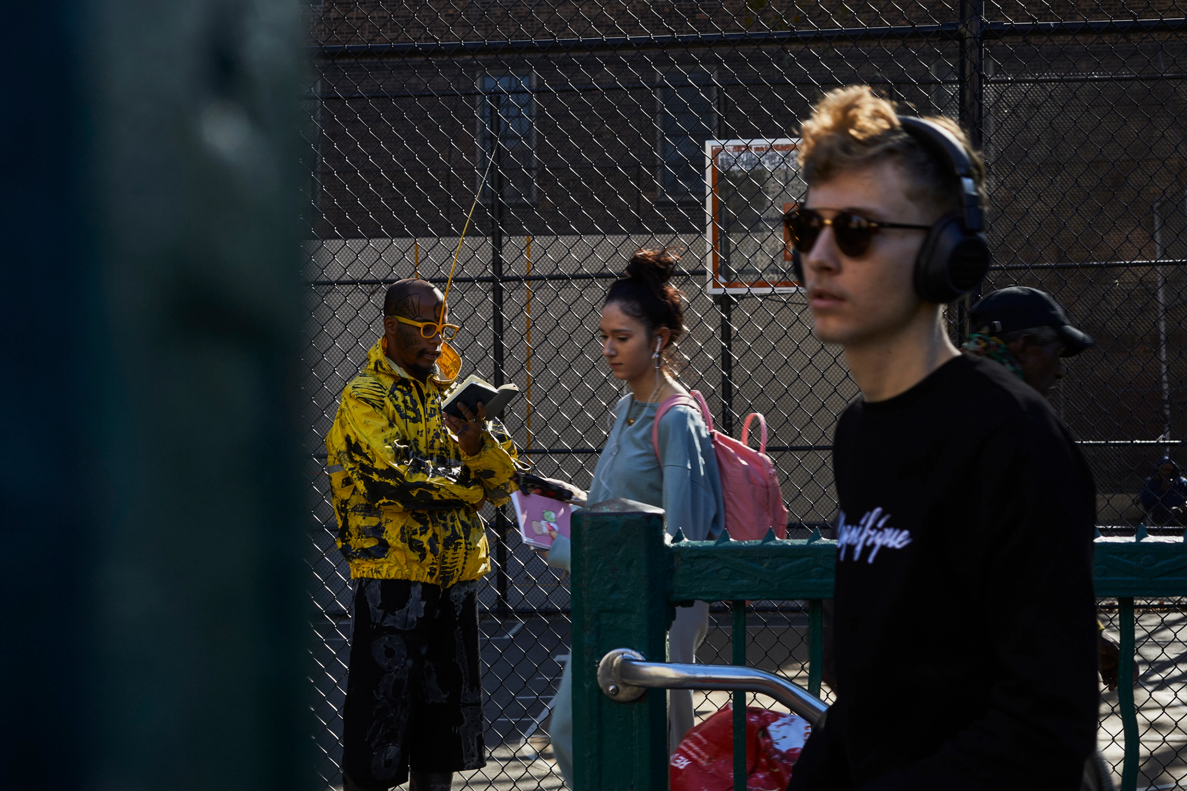Dig Ferreira in Brooklyn, looking at his notebook.