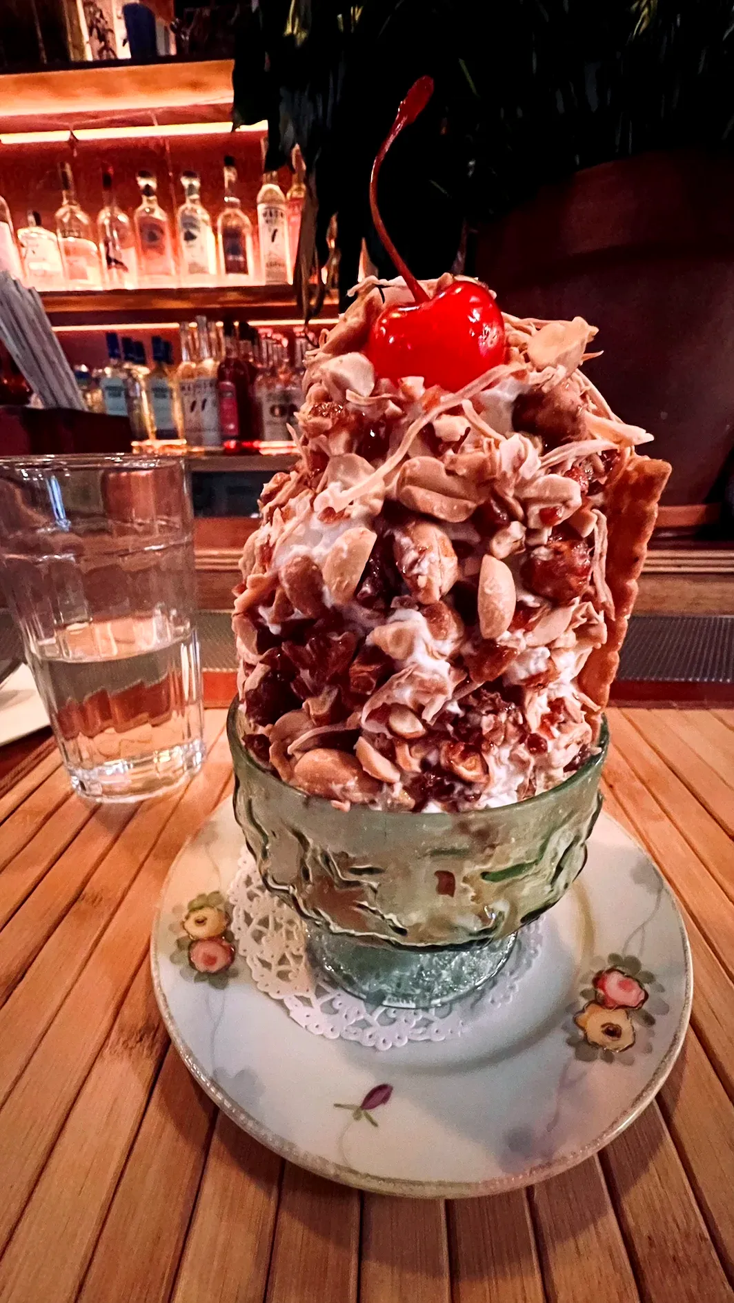 Thai Diner's signature Coconut Sundae dessert with coconut gelato, palm sugar whipped cream and candied peanuts